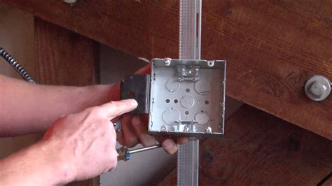 centering a junction box between studs|framing an outlet between studs.